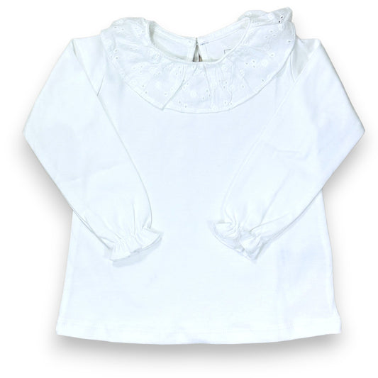 POLERA NIÑITA CON VUELO BLANCO